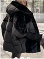 Stylish women's oversized black puffer jacket featuring luxury faux fur patchwork details - S / Tops / Black