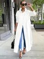 Elegant white longline button-down shirt tunic for women in a chic urban street setting - XL / Dresses / White
