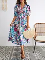 Élégante robe mi-longue bohème à imprimé fleuri avec col en V et manches bouffantes - S / Robes / Vert