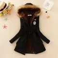 Detailed view of women's mid-length parka coat with warm fleece lining and fur hood - S / Tops / Black