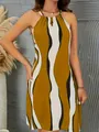 Détail d'une robe midi bohème sans manches à imprimé ondulé pour femmes élégantes - S / Robes / Curcuma