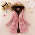 Detailed view of pink mid-length hooded jacket with warm fleece lining and faux fur trim - Bright Pink