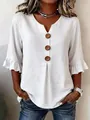 Close-up of white linen V-neck tunic with large decorative buttons and ruffle sleeves. - 3XL / Top (26115#) / White