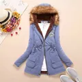 Detailed view of a blue mid-length hooded parka with warm fleece lining and fur trim. - M / Tops / Light Blue