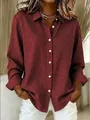 Detailed view of women's red and black gingham long-sleeved shirt with lapel collar - Dark Red