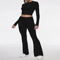 Women's black 2-piece set featuring long sleeve crop top and low waist flare pants - Black