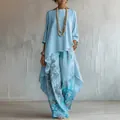 Elegante tunica asimmetrica azzurra abbinata a pantaloni larghi con stampa floreale - Taglia S / Top e Pantaloni / Blu