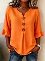 Detailed view of orange V-neck cotton linen blouse with ruffle sleeves and large buttons - S / Tops / Orange