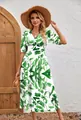 Detailed view of fashion printed V-neck women's dress with green floral pattern - Light Green