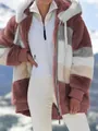 Detail view of women's warm plush color-block hooded jacket in a snowy mountain scene - S / Tops / Red