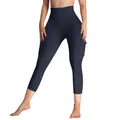 Detail view of navy blue high waisted yoga pants with side cargo pocket and button. - S / Bottoms / Dark Blue