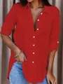 Detailed view of bright red oversized long-sleeve blouse with button-down front - S / Tops / Red