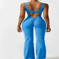 Bright blue athletic yoga jumpsuit with back cut-out detail and flared bottom style - Sky Blue