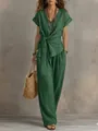 Elegante completo verde con top scollato a V con lacci e pantaloni a gamba larga - Taglia S / Parte Superiore e Parte Inferiore / Verde