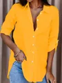 Elegant yellow button-up shirt for women, showing relaxed fit and casual style detail. - Yellow