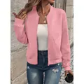 Stylish women's pink zip-up bomber jacket featuring unique textured diamond pattern fabric - Pink