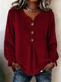 Detail of women's burgundy velvet blouse with V-neck and decorative wooden buttons - S / Tops / Burgundy