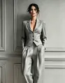 Full view of elegant gray single-breasted blazer and wide-leg trousers suit set for women - S / Top And Bottom / Gray