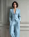 Front view of an elegant light blue single-breasted blazer and trousers suit set - S / Top And Bottom / Sky Blue