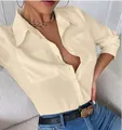 Elegante camisa beige de manga larga con bolsillos en el pecho para damas con estilo. - Albaricoque