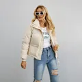 Women's chic beige short puffer jacket featuring a stand collar and loose fit style - White / L