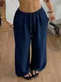 Comfortable navy blue textured wide-leg pants with elastic waist for a loose casual look - S / Bottoms / Navy Blue