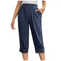 Close-up detail of women's dark blue cotton linen loose pants with large patch pockets - S / Bottoms / Navy Blue