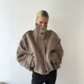 Modern women's wool coat featuring a high stand collar and shoulder tabs in beige - S / Tops / Khaki