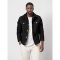 Detailed macro view of a men's black single-breasted woolen jacket with gold buttons - M / Tops / Black