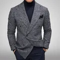 Detail view of a men's grey houndstooth double-breasted blazer with classic styling - S / Tops / Gray