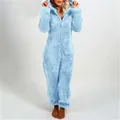Macro detail of light blue plush hooded onesie for women featuring zip front closure - S / Top And Bottom / Sky Blue