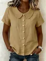Detail view of khaki cotton linen shirt with Peter Pan collar and pearl buttons - Khaki