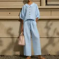Light blue cotton linen set featuring puff sleeve shirt and drawstring wide leg pants - S / Top And Bottom / Sky Blue