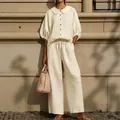 Elegant beige cotton linen two-piece set with lantern sleeve blouse and drawstring pants - S / Top And Bottom / Apricot