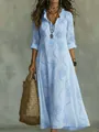 Detail shot of bohemian light blue floral print maxi dress with ruffle V-neckline - S / Dresses / Sky Blue