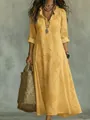 Detail of yellow bohemian dress with orange 3D flower print and ruffled V-neckline. - S / Dresses / Yellow
