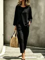Stylish black long-sleeved two-piece set shown on model in urban street background - S / Top And Bottom / Black