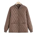 Front view of a brown diamond-quilted bomber jacket with snap buttons on a wood hanger - S / Tops / Coffee