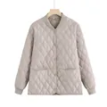 Front view detail of a loose quilted jacket for women featuring diamond patterns in gray - S / Tops / Gray