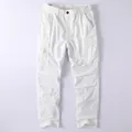 Vintage white cotton cargo pants with multiple pockets in a relaxed straight leg fit for men - 38 / White