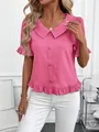 Detailed view of pink short sleeve blouse with ruffle hem and Peter Pan collar - S / Tops / Deep Pink