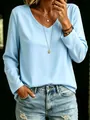 Close-up of a women's light blue V-neck long sleeve T-shirt styled with accessories - S / Tops / Light Blue