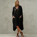Abito ampio in cotone e lino nero con scollo a V, orlo irregolare e grandi tasche - Taglia S / Vestiti / Nero