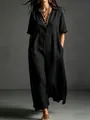 Detail view of an elegant black cotton linen short sleeve maxi dress with lapel. - S / Dresses / Black