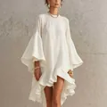 Elegant white loose asymmetrical dress with large bell sleeves and ruffle hem details - S / Dresses / White