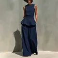 Completo due pezzi minimalista in cotone e lino blu navy con top peplo e pantaloni - Taglia S / Top e Pantaloni / Blu navy