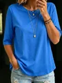 Detail showing the royal blue fabric texture and fit of the crew neck top on a model - S / Tops / Dark Blue