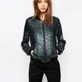 Close-up detail of a sparkling dark green sequined bomber jacket with black rib trim - L / Tops / Laser Blue