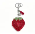 Porte-clés fraise étincelant en strass rouges avec pompon et clochette argentée chic - Gland Fraise