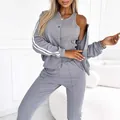 Full view of grey three-piece leisure set featuring striped jacket and slim tank top - 3XL / Set / Gray